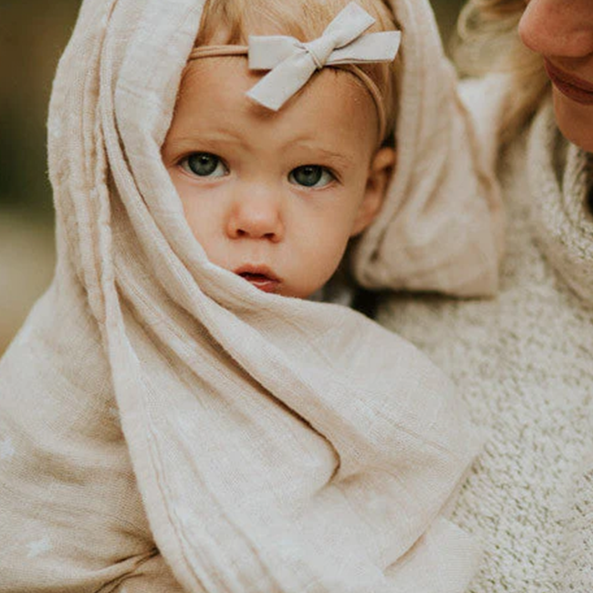 Little Unicorn - Cotton Muslin Swaddle Blanket - Taupe Cross