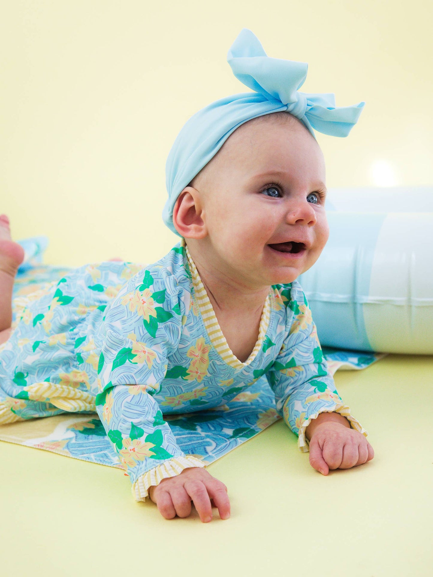RuffleButts + RuggedButts - Baby Girls Blooming Basket LS OP Bow Peplum RG Swimsuit wi/Ruffles