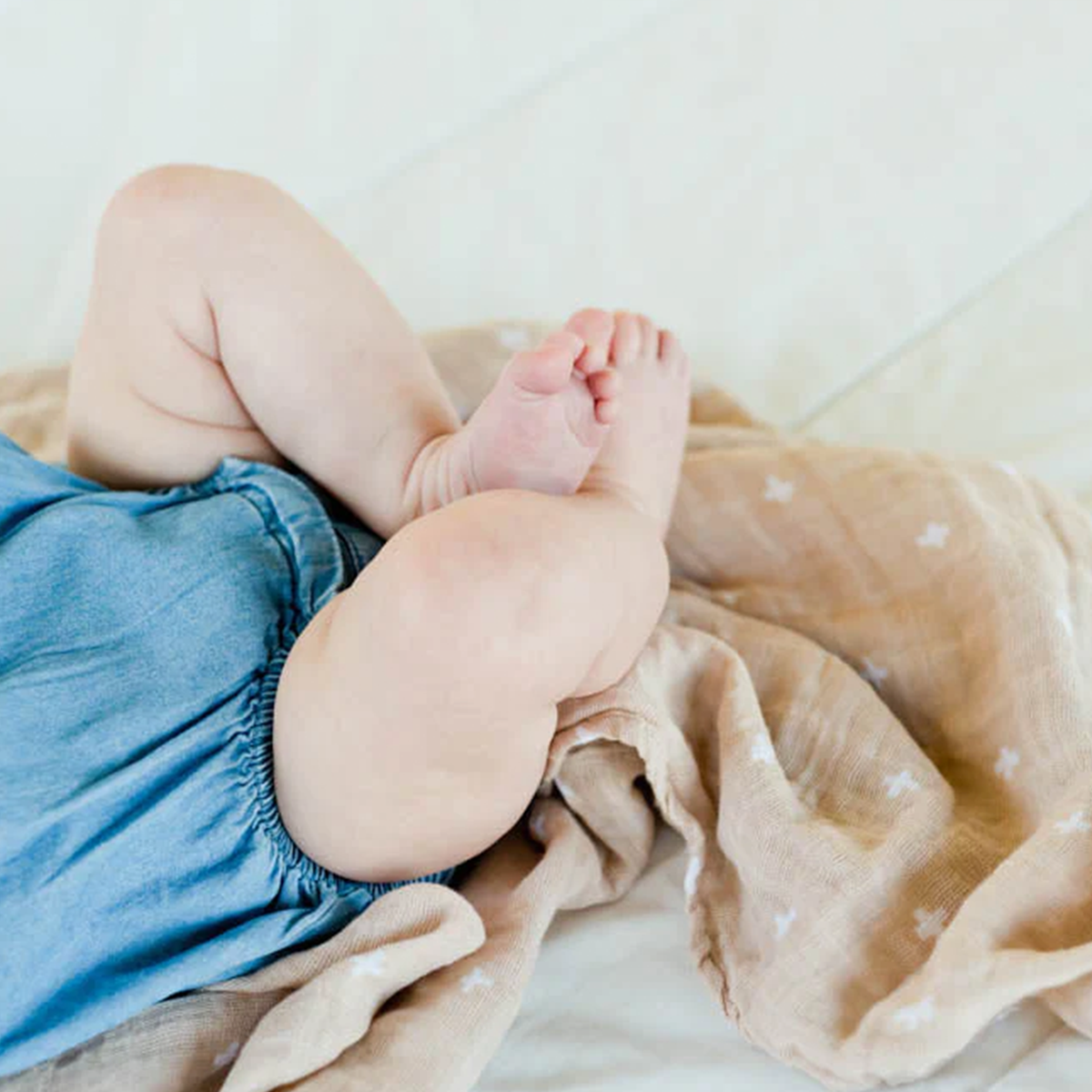 Little Unicorn - Cotton Muslin Swaddle Blanket - Taupe Cross